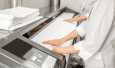 Streamlined Operations with Automatic Ironing Machines and Commercial Laundry Equipment.