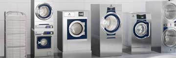 Comprehensive hospital laundry services with stacked washing units