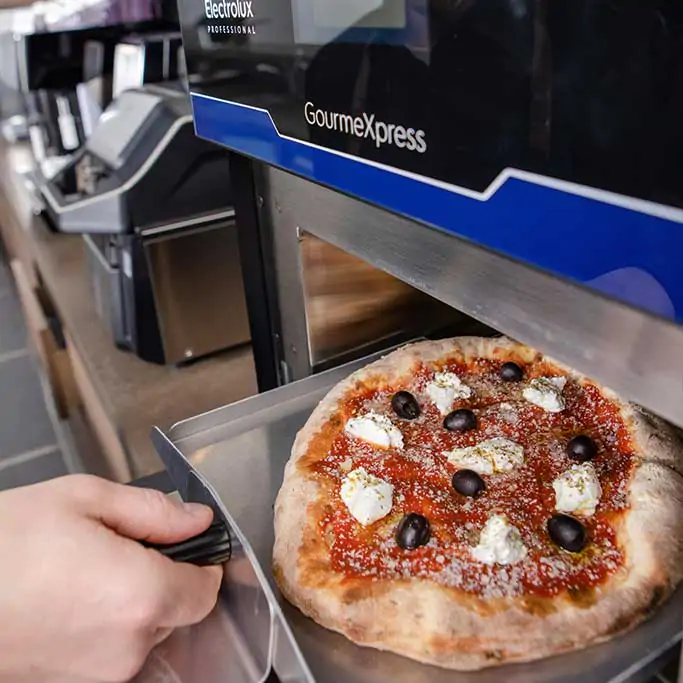 pizza and showel in High Speed Oven pizza and showel in High Speed Oven