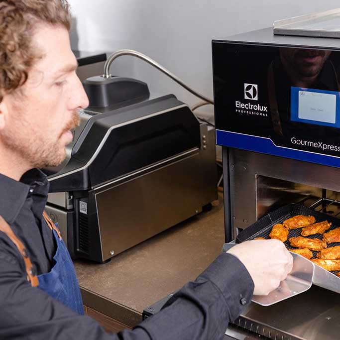 chef using High Speed Oven