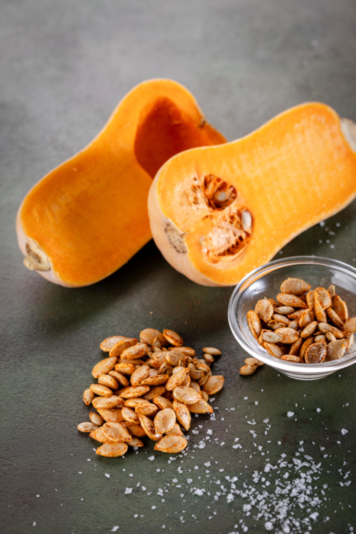 Zero waste Pumpkin seeds snack with pumpkins and salt