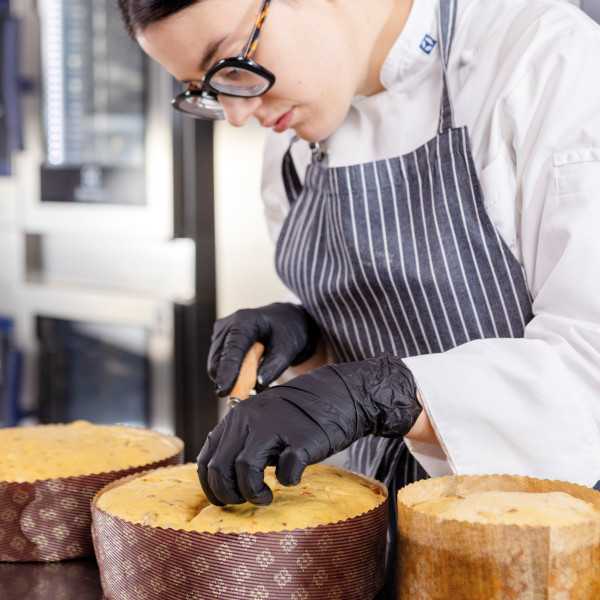 baker preparing panettones