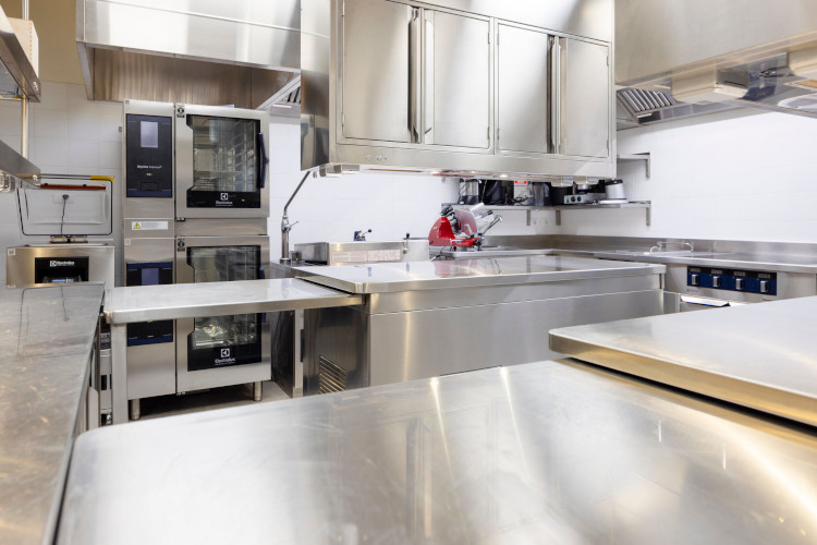 functional kitchen furbished with inox fittings provided by Electrolux Professional