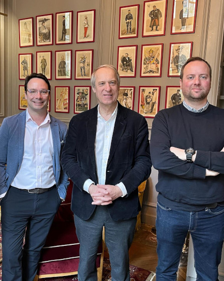 Three representatives from the hotel Alfred Sommier and partners involved in Electrolux Professional project, standing in an elegant interior