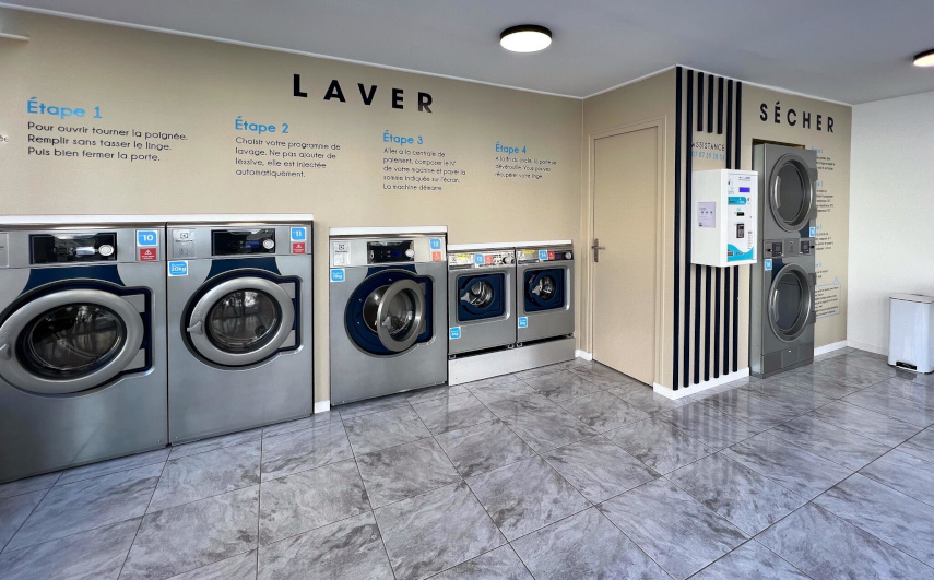 Electrolux Professional self-service washing machines atSt Omer Laundromat modern laundry facility